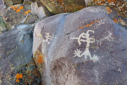Ancient petroglyphs of two archers with bows and arrows at Coso Range, California
