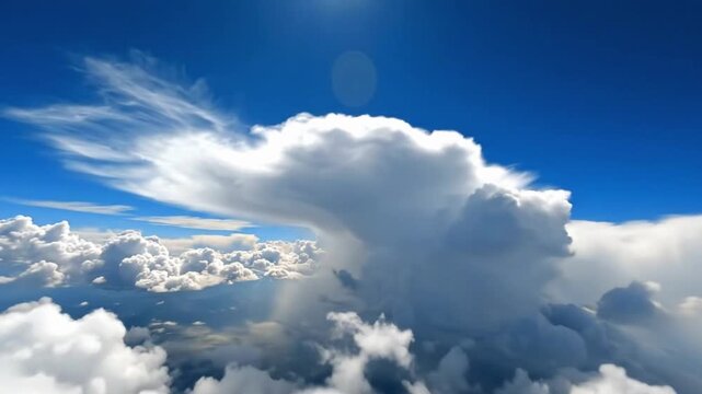 Movement of clouds in a blue sky with white clouds recorded at high altitude during daytime
