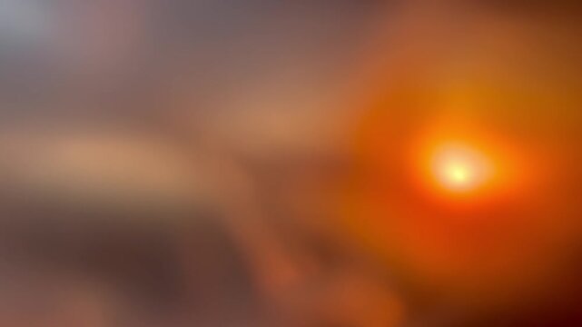 Abstract blurred sunset background with frosted glass texture