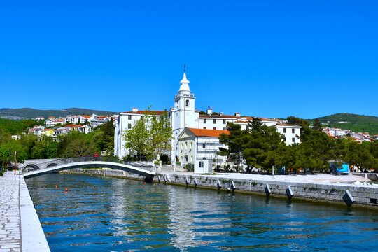 Church of the assumtion next to a bridge across river Dubračina in Crikvenica, Primorje, Croatia