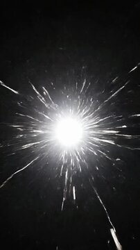 Bright flashing white light creates strobe effect in dark environment during evening hours