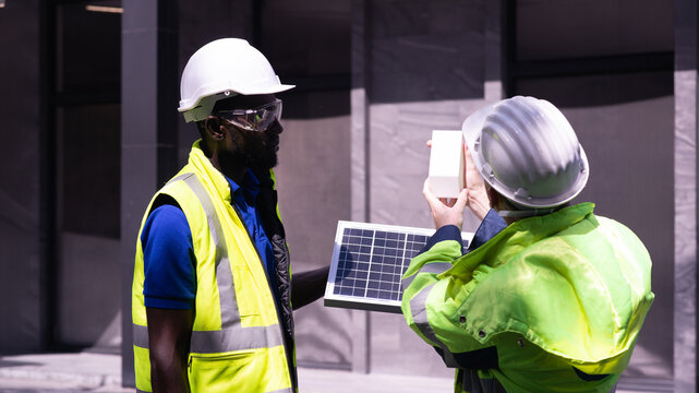 Solar engineer analyzing, planning, and executing the installation of solar panels for renewable energy systems