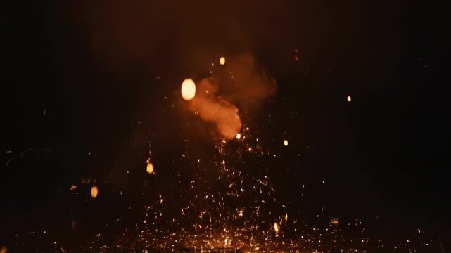 Explosion of Sparks in Dark Background ideal for sleek commercial backgrounds and title sequences
