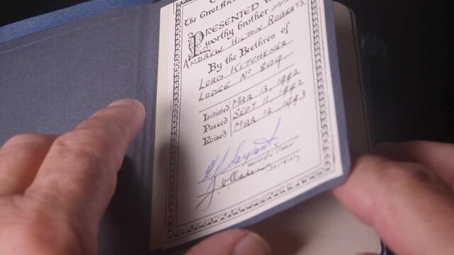 Freemason Bible Presentation with Hand Turning Pages and Masonic Symbol on Cover