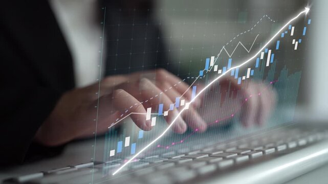 A business professional analyzes data on a keyboard while digital charts and graphs depict financial growth, illustrating the importance of data-driven decisions in today market. Copula