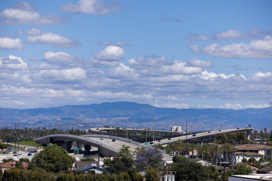 Fullerton, California, USA - April 11, 2026: Afrernoon traffic passes along the 5 and 91 freeway interchange between Buena Park and Fullerton.
