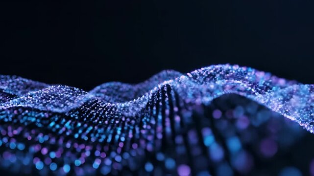 Abstract flowing blue digital particles forming a wave on a dark background.
