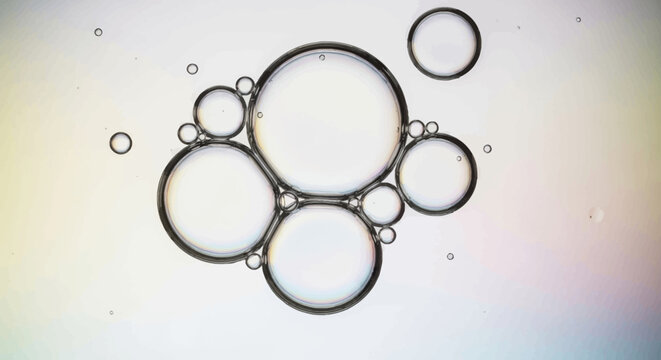 Abstract Macro Oil Bubbles Floating on Water Surface