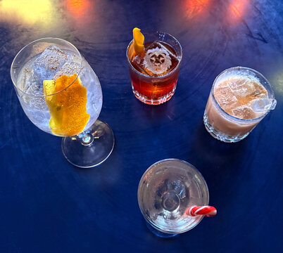 Four delicious cocktails on a table