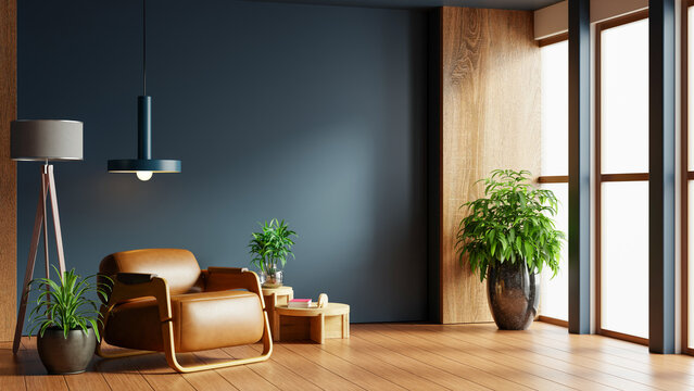 Modern living room interior design with brown leather armchair, green plants, and blank dark blue wall for mockup- 3D rendering