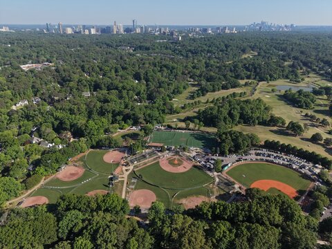 Aerial view of Chastain Park baseball fields with Buckhead and Midtown Atlanta skyline