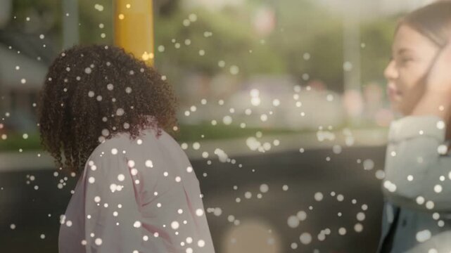 Two women entering walking path causing ads icons rising around phone in bokeh while checking map