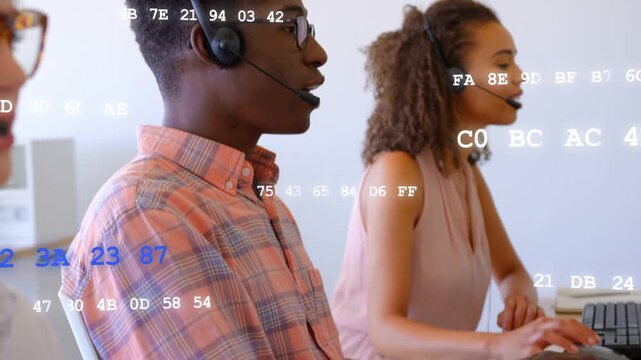 Call arriving, male rep adjusting headset and speaking, female typing, code overlay aiding support