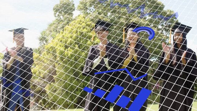 Grads standing on lawn, blue chart sweeping across spurring clapping and raising arm for graduation