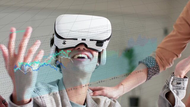 Man in white VR HMD reacting as VR demo starting, HUD tracking, companion steadying shoulder
