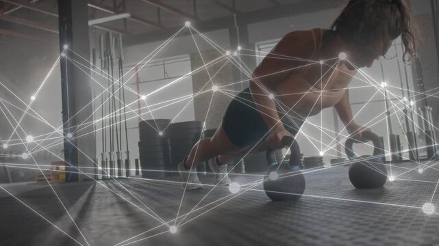 Woman gripping kettlebells doing plank presses and alternating rows, overlay showing core fitness