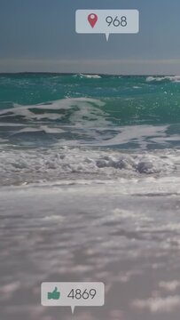 Vertical video: Pin popping lower-right, bubbles rising and drifting over surf showing likes rising