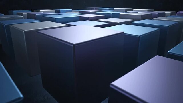 A collection of various colored geometric cubes arranged in a grid pattern, creating a modern abstract background design element