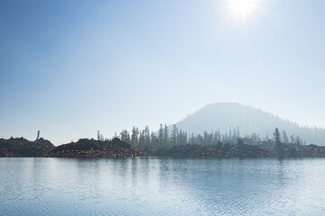 Fototapeta premium Wizard Island in the fog at Crater Lake National Park, Oregon