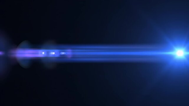 Lens flare effect on black background, abstract blue light streak with bokeh and light rays