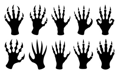 Fototapeta premium Collection of twelve distinct monster hands with sharp claws raised up in different positions on white background