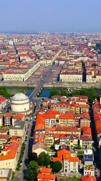 Vertical video. Turin, Italy. Flight over the city. Catholic Parish Church Gran Madre Di Dio. Drone footage, Point of interest. Rich colors