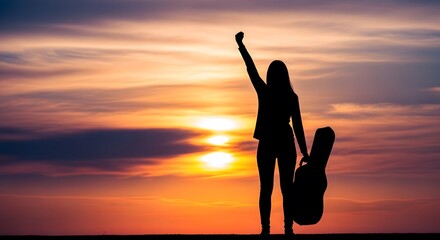 Fototapeta premium Happy music day silhouette with guitar against a vibrant colorful background concept