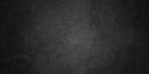 Dark charcoal grunge wall texture background. Dark black rough grunge surface with smoke edge. Black texture chalk board and black board. © MDFAIMIDULISLAM