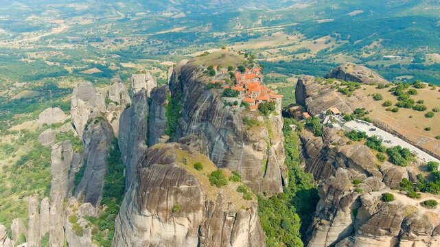 Meteora, Kalabaka, Greece. Monastery of the Transfiguration of the Saviour. Meteora - rocks, up to 600 meters high. There are 6 active Greek Orthodox monasteries listed on the UNESCO list. Drone foot