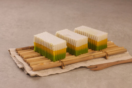 Talam labu is a traditional Southeast Asian layered dessert made from pumpkin, coconut milk, and rice flour, known for its soft and silky texture. 