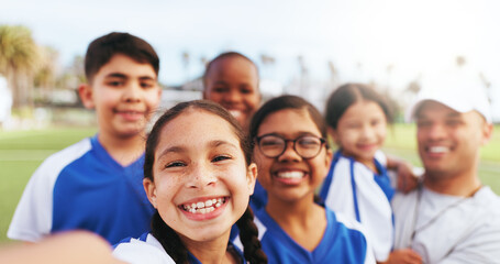 Portrait, children and selfie with team at soccer field, photography and memory after football match. Outdoor, kids and profile picture with coach for social media, fitness and skill development © peopleimages.com