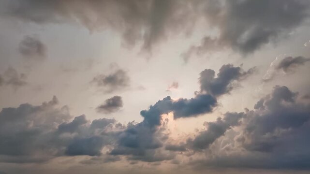 Cloudscape Serenity: A panoramic view of a tranquil sky adorned with a tapestry of clouds, evoking a sense of calm and expansive wonder. 