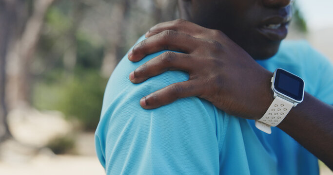 Black man, hands and fitness with shoulder pain in nature for workout accident or strain. Active, male person or sore arm with discomfort for fibromyalgia, overworked exercise or muscle tension
