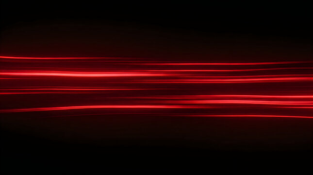 Abstract red light streaks moving fast on a dark background