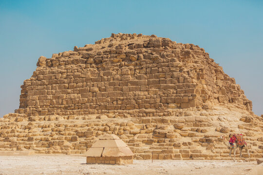 Close-up of Ancient Limestone Pyramid Blocks in Giza with Camel and Copy Space