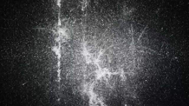 White grunge loop over black background showing textured visual design with random patterns