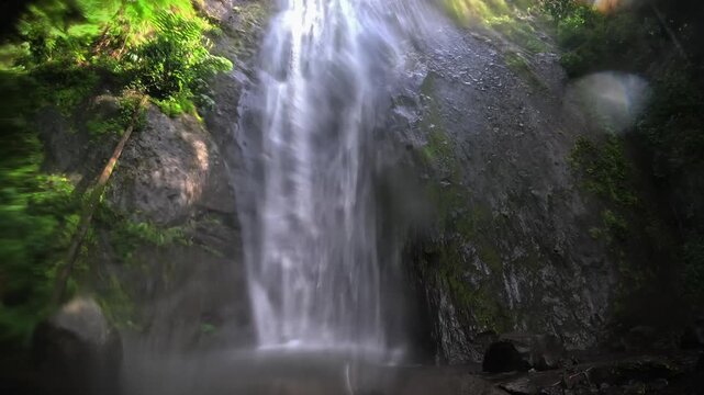 Dolo waterfall, Kediri, East Java, in Indonesia flows rapidly in the morning