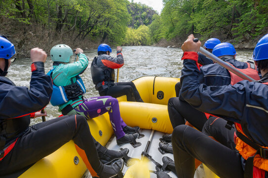 Rafting team in an inflatable boat down the Struma river, Bulgaria