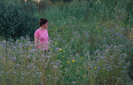 woman among the vegetation in the countryside