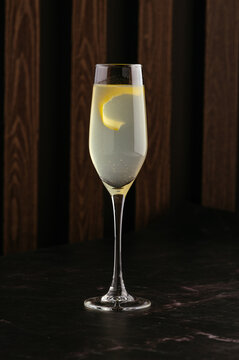 alcoholic cocktail with lemon juice on the bar table