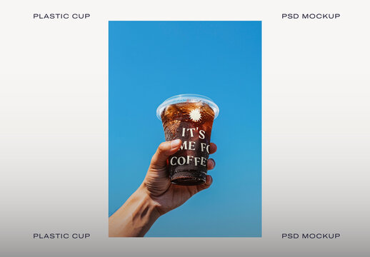 Hand Holding Iced Coffee Cup Mockup PSD