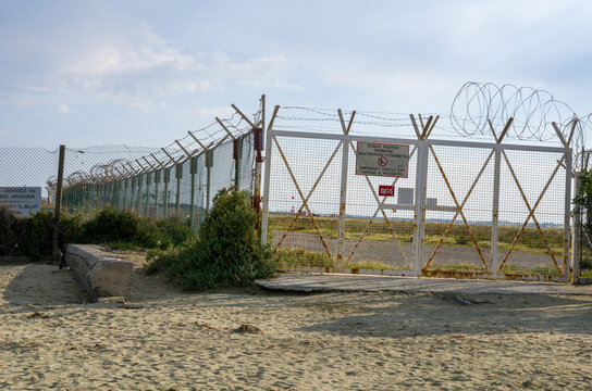 Restricted Area Fenced Gate with Barbed Wire