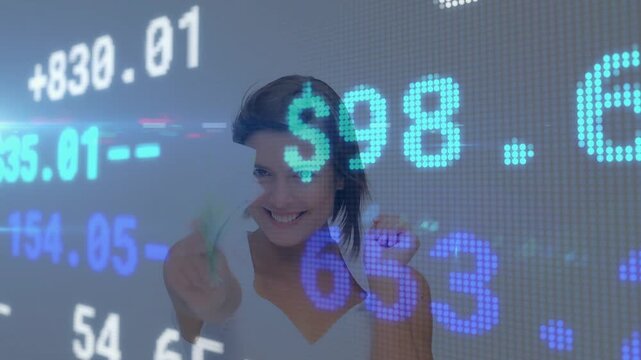 Woman holding banknotes and waving bills, showing cash while financial tickers scrolling over her