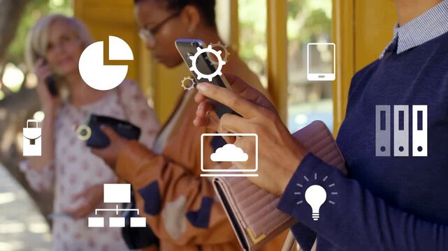 Right woman tapping phone while camera panning right, icons floating over yellow stop, showing tech