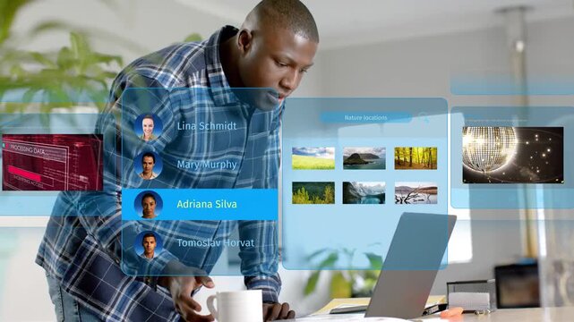 Man using laptop trackpad in tech desk, managing holo contacts, previewing media while lifting mug