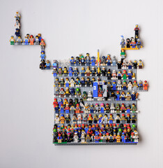 Naklejka premium Gothenburg, Sweden - February 18 2018: Large wall display of colorful Lego minifigure collection.