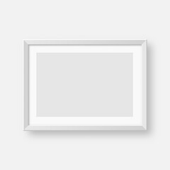 Obraz premium Realistic blank white picture frame. Modern poster mockup for artwork, photography, or advertising. Perfect for art galleries, interior decor, and branding. Vector illustration