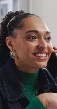 Smile, speaking and woman with phone call in creative agency, manuscript feedback or project update. Mobile, draft revision tips or screenwriter with production budget negotiation, story idea or talk