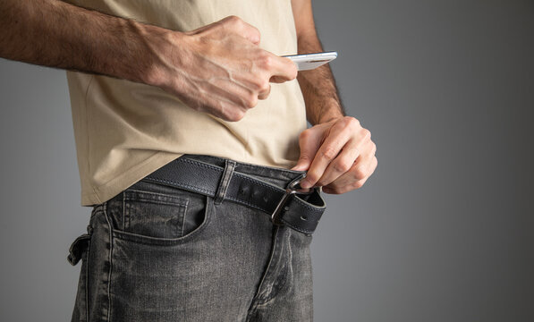 Man with a phone taking picture the penis.