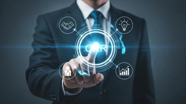 Businessman pointing to OKR acronym with for handshake, lightbulb, person, and graph